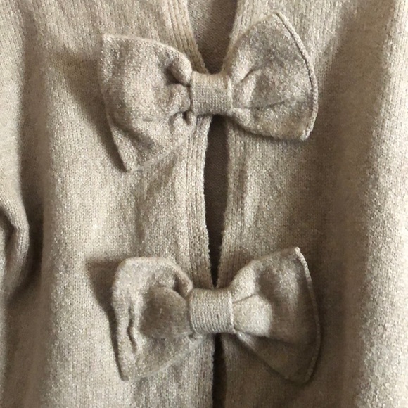 Brown sweater with bow ties on back. - Picture 3 of 3